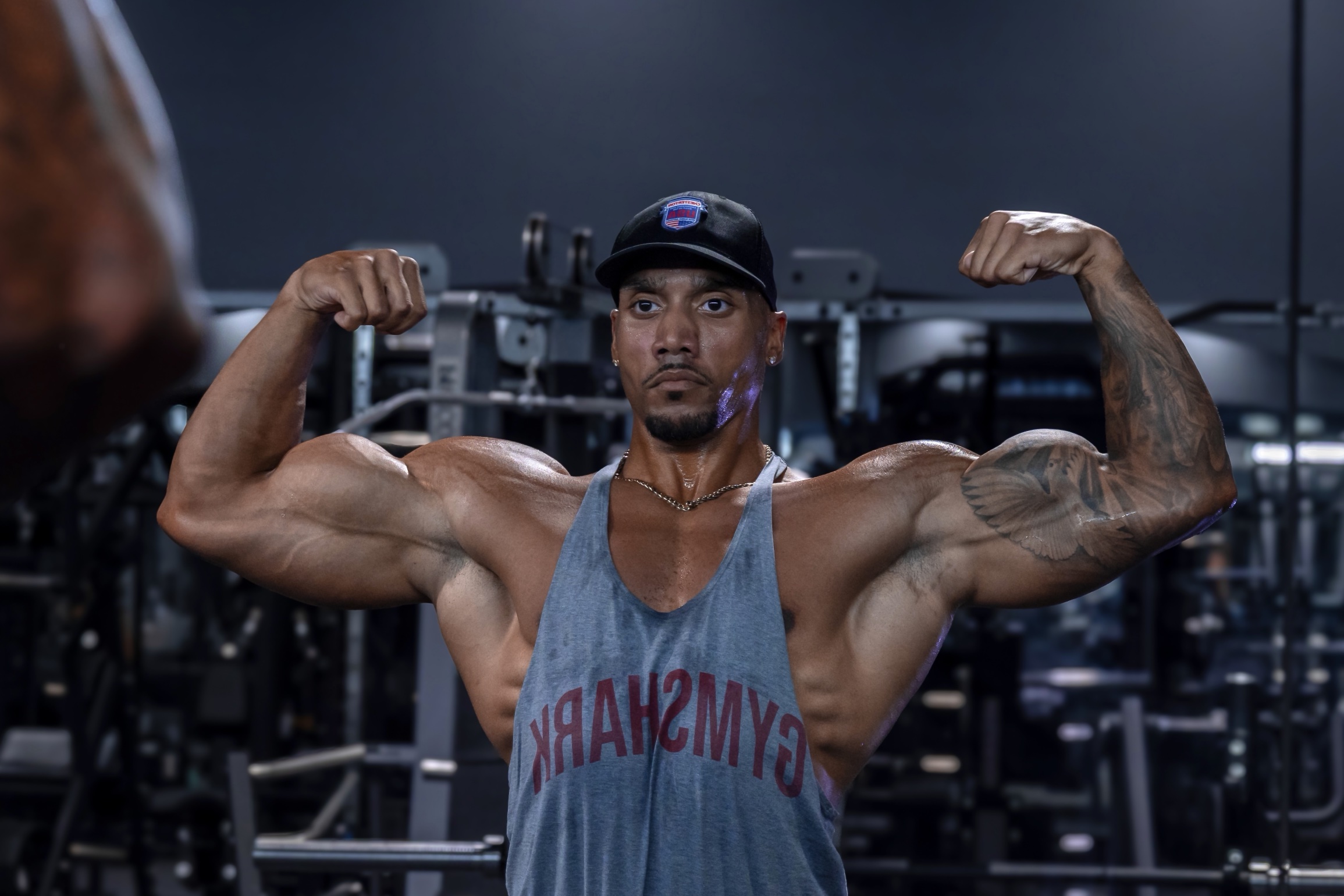Joshua Mabin Front Double Bicep Gymshark Tank in Gym